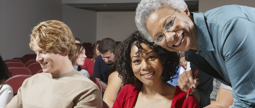 Professor with Student in Lecture Hall