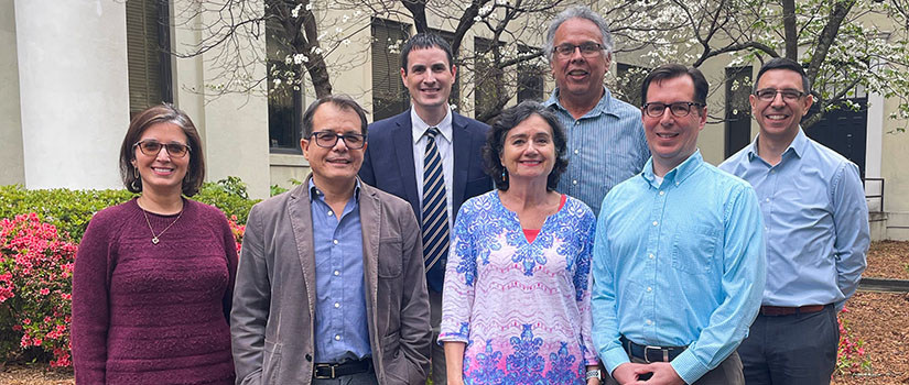 In photo left to right: Nelis Soto-Ramirez (front), Jorge Camacho (front), Lenny Sánchez (back), Myriam Torres (front), Ray Torres (back), Andrew Graciano (front), Juan Caicedo (back) 												 												Not pictured: Ana Cuento, Ana Lopez-Defede, Beatriz Kellogg, Bruno Alcalde, Carlina de la Cova, Claudia Benitez-Nelson, David Cardenas, David Martinez, Diego Leal Castro, Edena Guimaraes, Franic Gadala-Maria, George Roy, Joao Albin-Pimentel, Jorge Crichgno Benitez, Juan Tellez, Jula Lopez-Roberson, Lucas Lima de Vasconcelos, Marius Valdes, Mercedes Lopes Rodriguez, Nina Moreno, Paula Vasquez