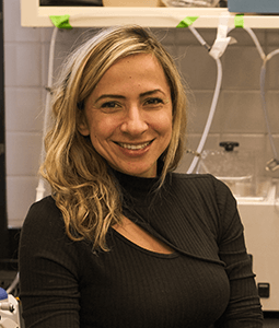 Portrait of Dr. Wenceslau in her lab at USC's School of Medicine. 