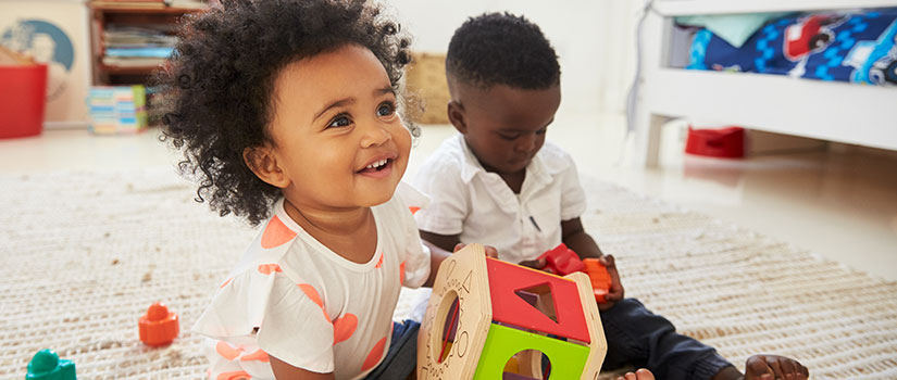 2 young children playing together