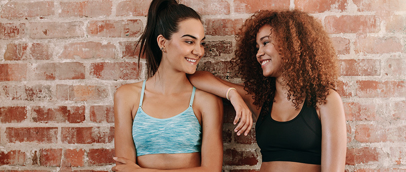 Two women relaxing after a workout