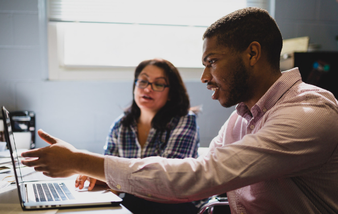 undergraduate students work with faculty team