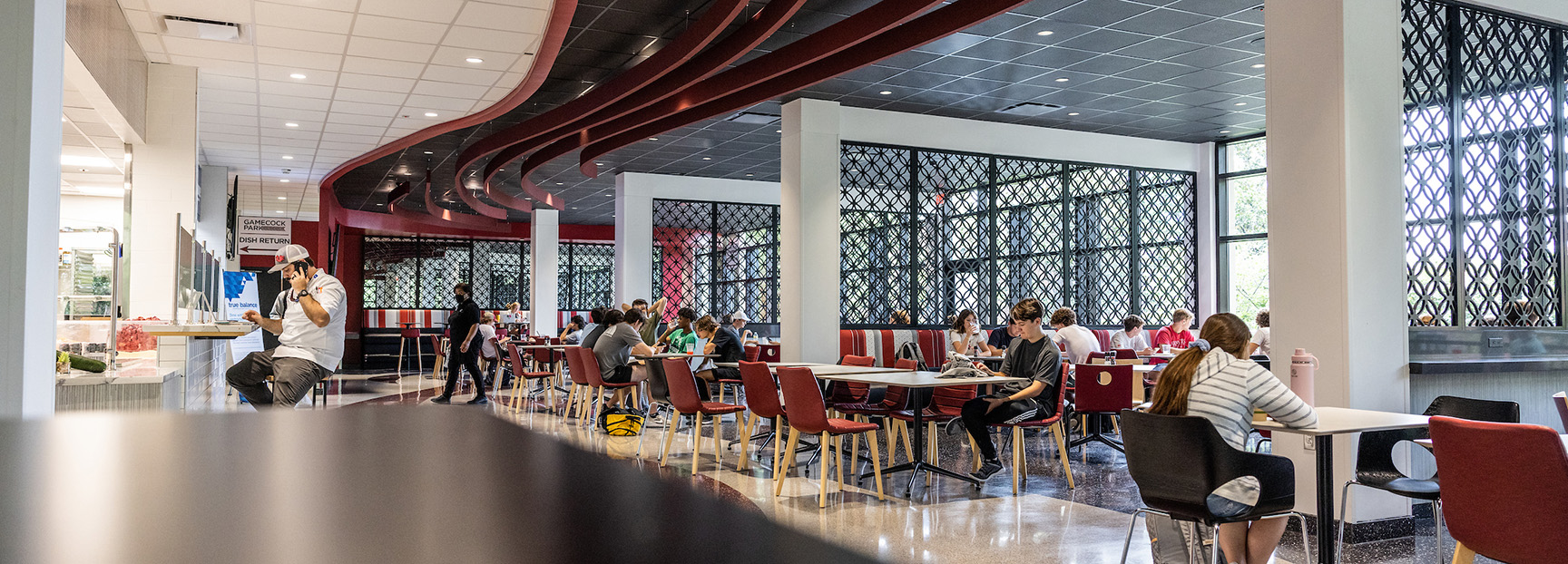 Gamecock Park dining space with students sat at tables
