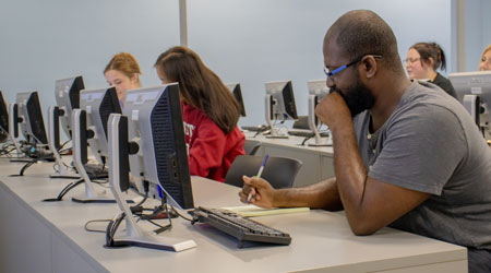Students work in a computer lab.