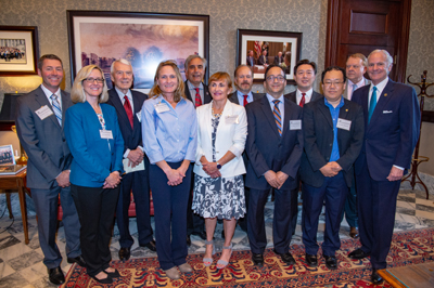 Hui Wang receiving the 2019 Governor's Young Scientist Award for Excellence in Scientific Research by South Carolina Governor Henry McMaster at the Statehouse.