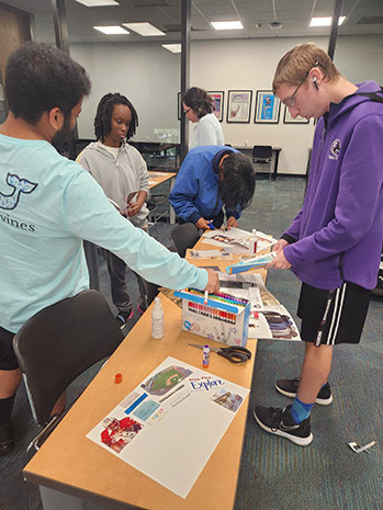 CarolinaLIFE students working on collage project