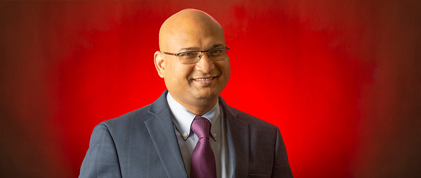 Sourav Banerjee smiles.