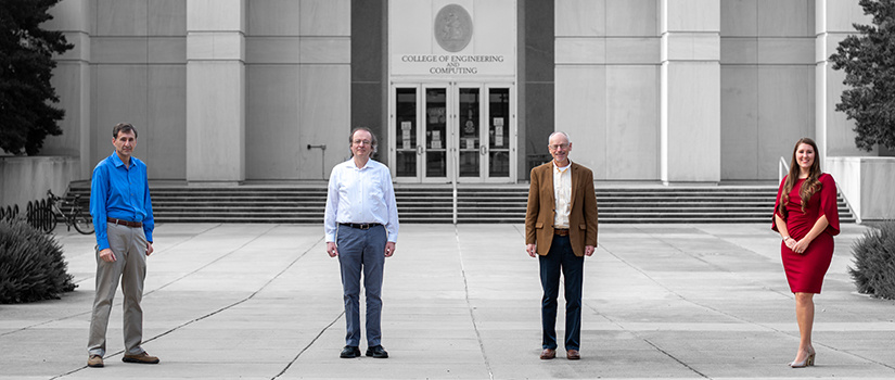 The power electronics team stands in front of Swearingen.