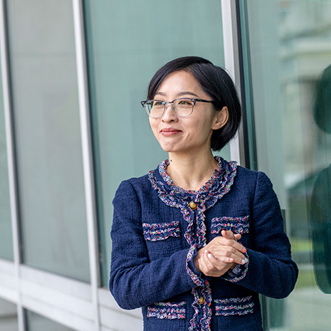 Lucy Yu stands in the Courtyard