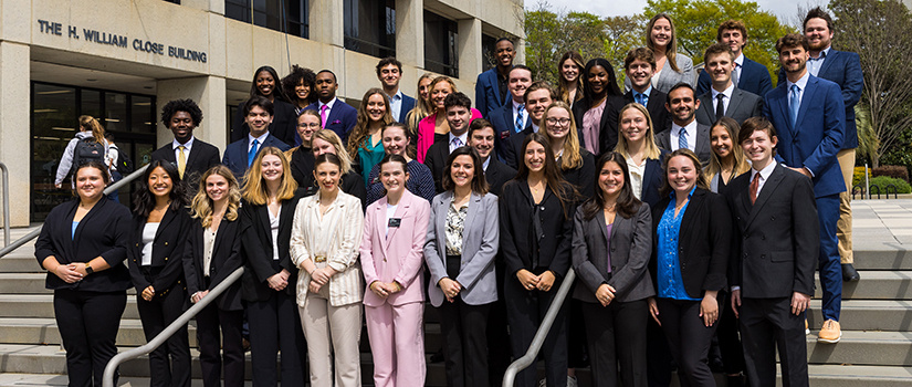 HRSM Student Leaders pose on the steps outside the Close-Hipp Building.