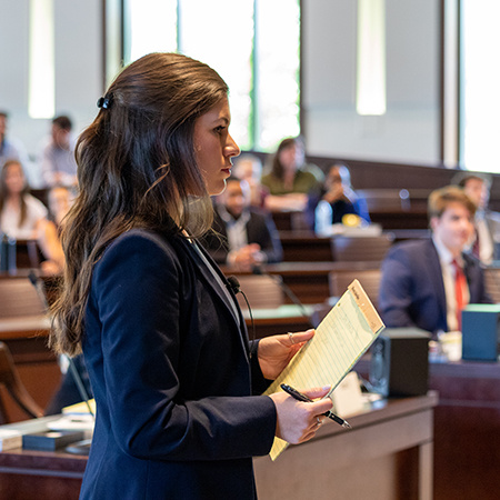 Student presenting argument during mock trial