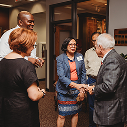 Group of Faculty Shaking Hands