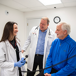 Students with a patient in room