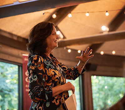 Janice Edwards addresses alumni and friends at her retirement event.