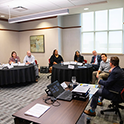 Group of individuals in a conference room