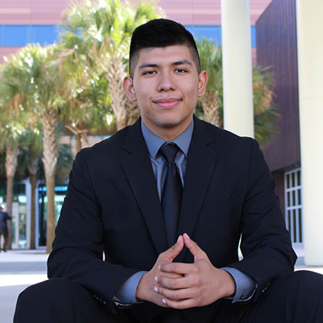 Image of William Mendoza in the Moore School courtyard