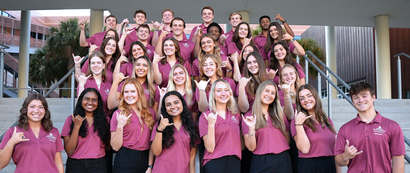 current Moore School student ambassadors posing on Greene Street steps leading to Moore School building