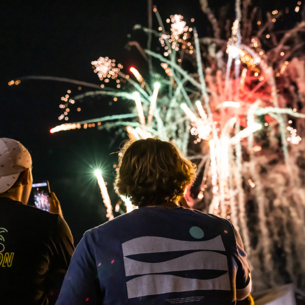 students watching fireworks at First Night Carolina