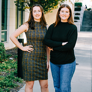 The McBride sisters stand side by side. 