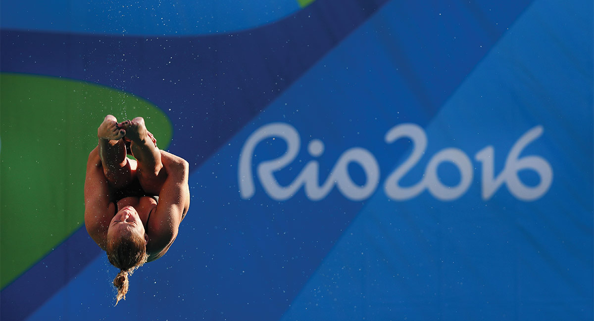 woman diving with the words Rio 2016 in the background